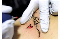image of tattoo art in action