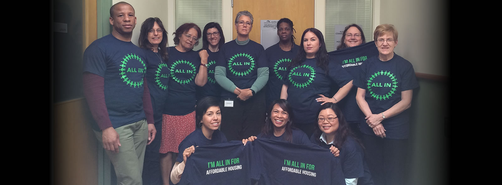 The Alameda County Housing & Community Development staff wearing their ALL IN t-shirts.